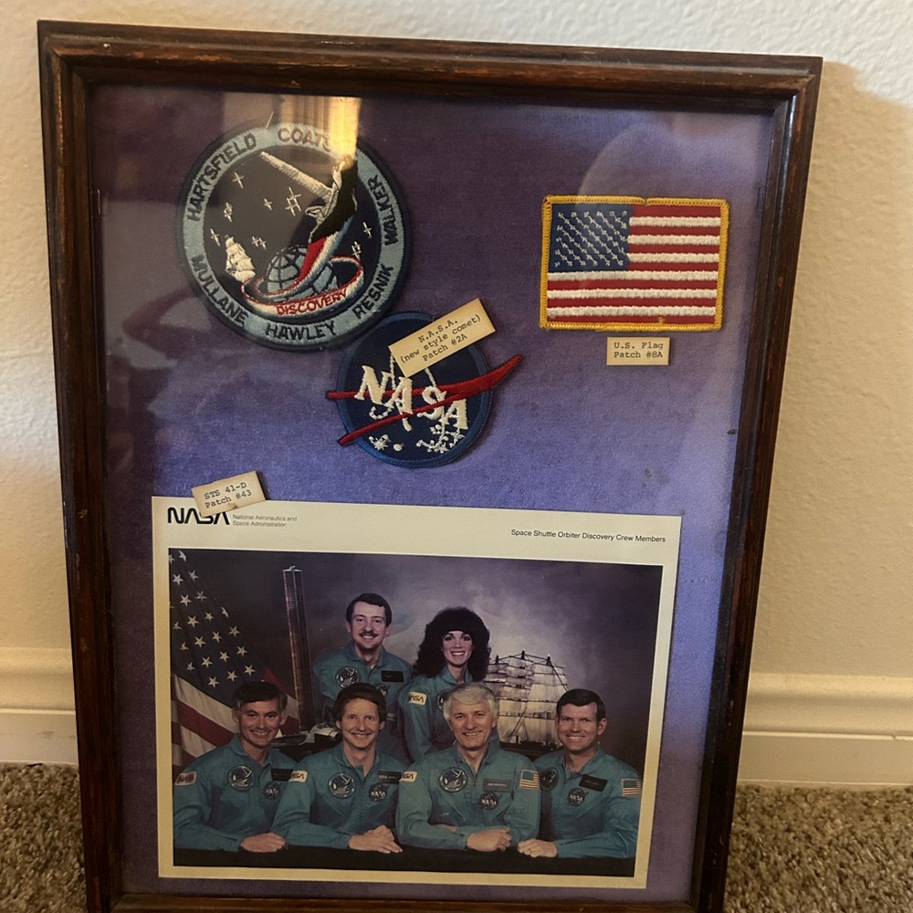 Framed Space Shuttle Crew Memorabilia in Purple Display